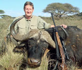 Kilimanjaro Custom Rifles Founder Erik Eike and Trophy of Cape Buffalo