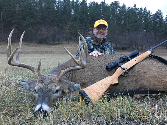 Bill with Whitetail and Kilimanjaro Leopard Rifle in 6.5x55 Swede