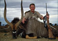 Kilimanjaro Rifles Founder Erik Eike with trophy of  a Nyala.